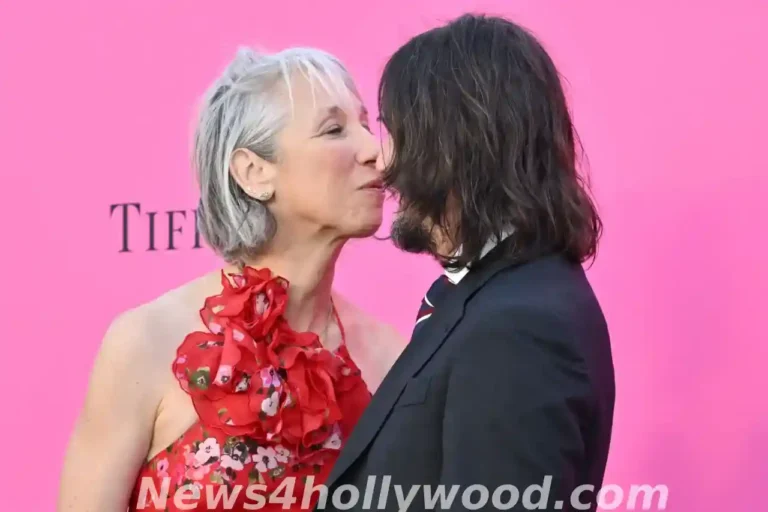 Keanu Reeves and girlfriend Alexandra Grant set the red carpet on fire with a sizzling kiss